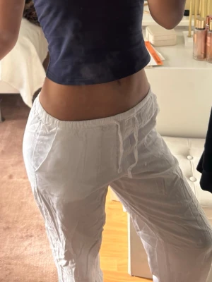 Low Rise White Linen Pants -   Beautiful low-rise white linen trousers with a relaxed, effortless fit. Perfect for a minimalist Scandinavian wardrobe and the clean Stockholm style aesthetic. Lightweight, breathable, and ideal for summer, vacations, or everyday wear.  * Low-rise fit * White linen look * Relaxed and timeless style * Easy to dress up or down * Great condition