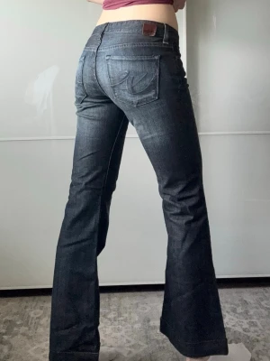 Wrangler jeans - Wrangler Jeans. Midjemått: 37 cm ,Längd: 74 cm