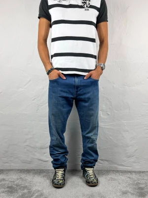 Replay jeans  - Ett par snygga jeans från Replay i storlek W32 L34 i modellen Mickym Hyperflex 