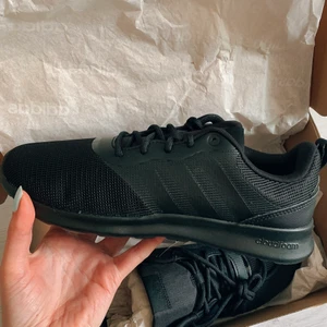 Adidas black running shoes  - New in box, adidas shoes. Marked size 40 but more a small 39. (I usually have 39/40 and they are too small) 
