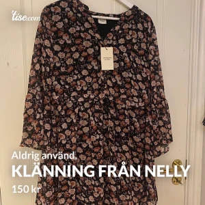 Klänning från Nelly  - Aldrig använd 