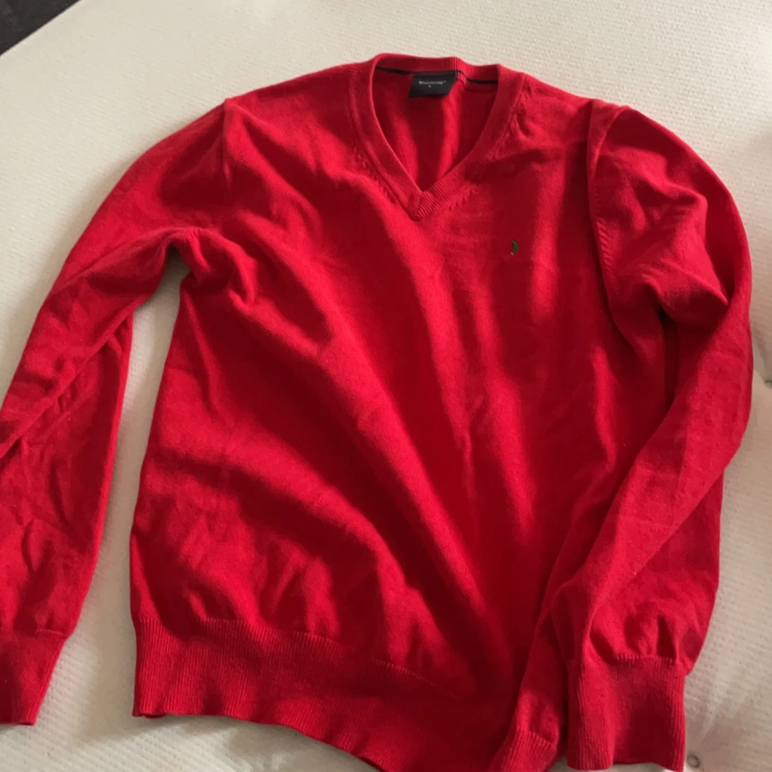 Röd stickad tröja