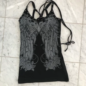 Rock klänning - Cool tight klänning som också fungerar som tröja. Fin snörning i ryggen. Skriv för fler bilder!