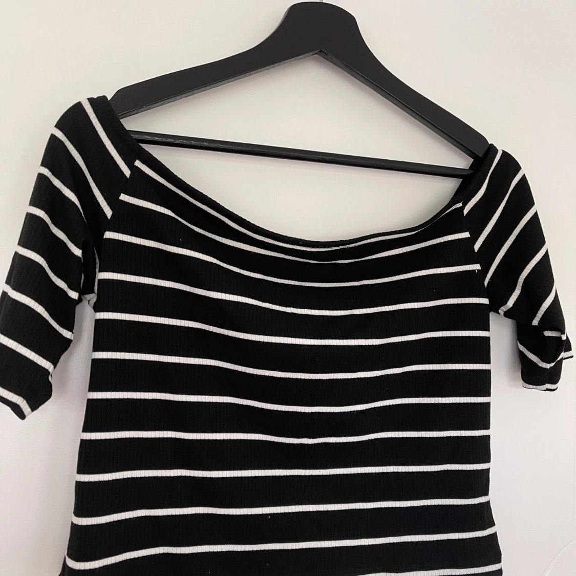 Over the shoulder top