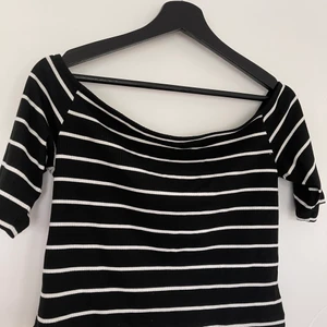 Over the shoulder top  - stripped over the shoulder stop! it’s practically new since I never wore it!