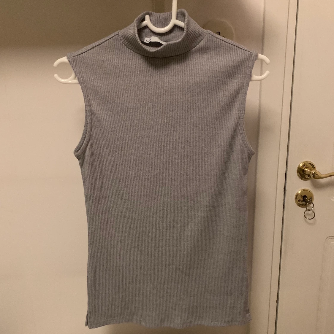 Linne med halvpolo i strl M