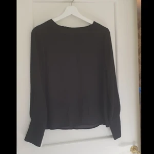Svart topp - Använt skick
