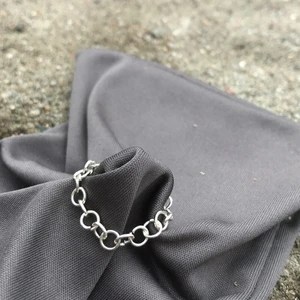 Egengjord kedjering - En lös kjedjering i steerlingsilver.      stl: S-M                      Den är Nickel fri, Bly fri och Kadium fri!!!