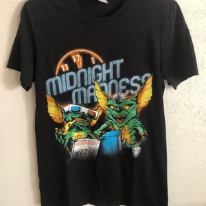 Classic 80’s Gremilns Movie Tee - Classic 80’s Gremilns Movie T-Shirt  Size small, men’s fit.  New unworn condition, no flaws or damage.  DM if you need exact size measurements.   Buyer pays for all shipping costs. All items sent with tracking number.   No swaps, no trades, no offers. 