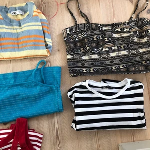 5 olika toppar  - Säljer 5 olika toppar i ett paket. Bra skick på allt. Några är secondhand. Köp allt för 120kr!