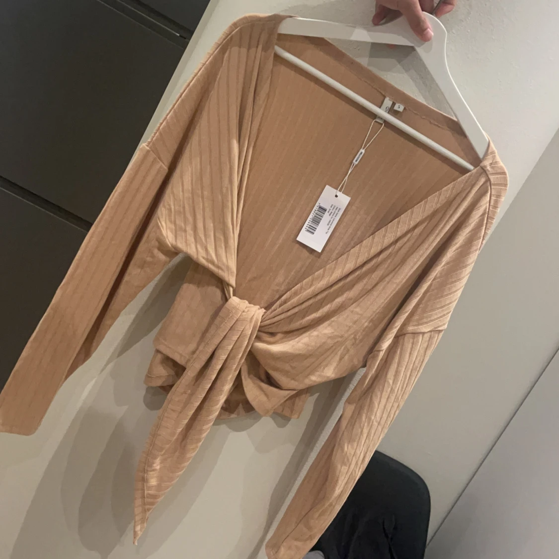 Tröja som man knyter i midjan