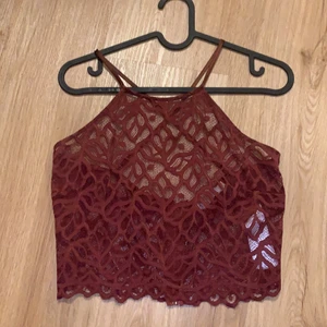 Linne från NAKD - Genomskinligt linne storlek M. Från NA-KD. Dragkedja och korsat band i ryggen. 