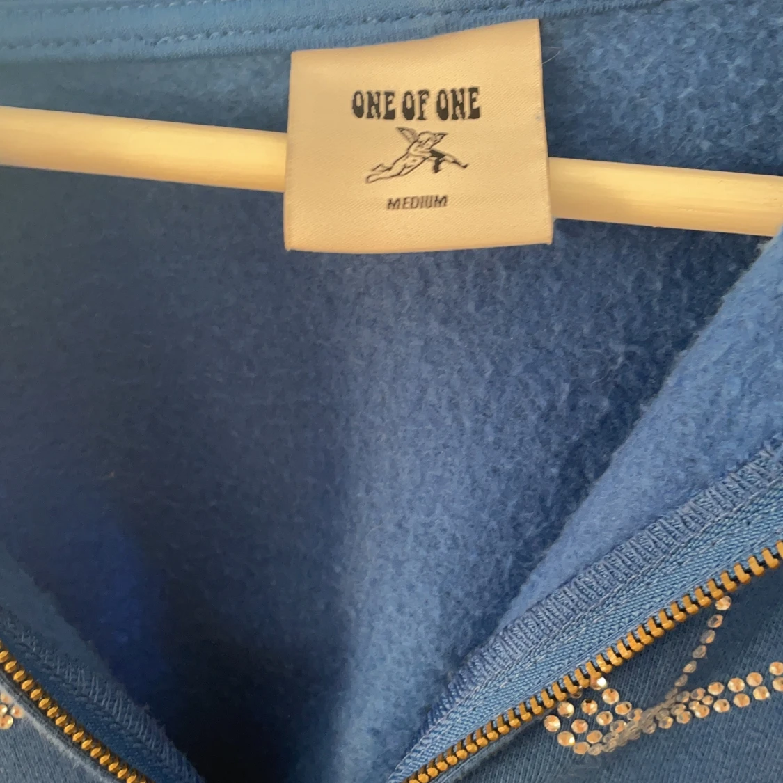 One of one hoodie storlek M