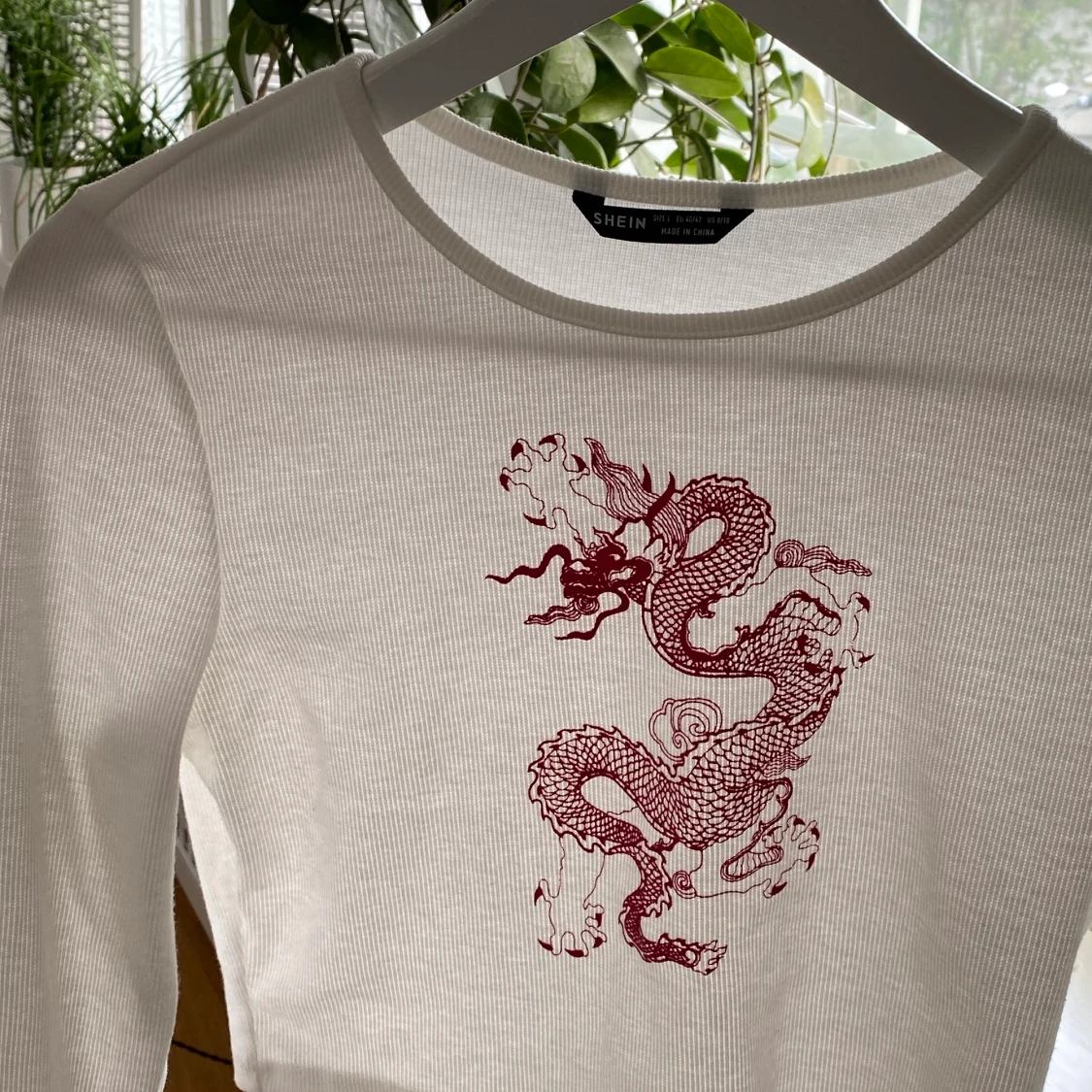 Topp med coolt tryck - 90