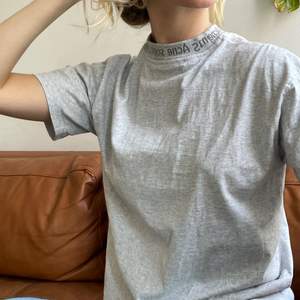 Grey T-shirt from Acne 