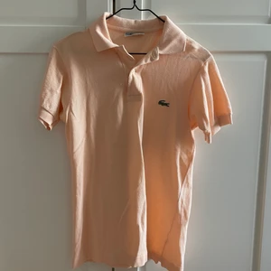 Piké  - Aprikos piké från Lacoste