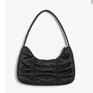 Väska från Monki - Använd max 2 ggr och i fint skick!
