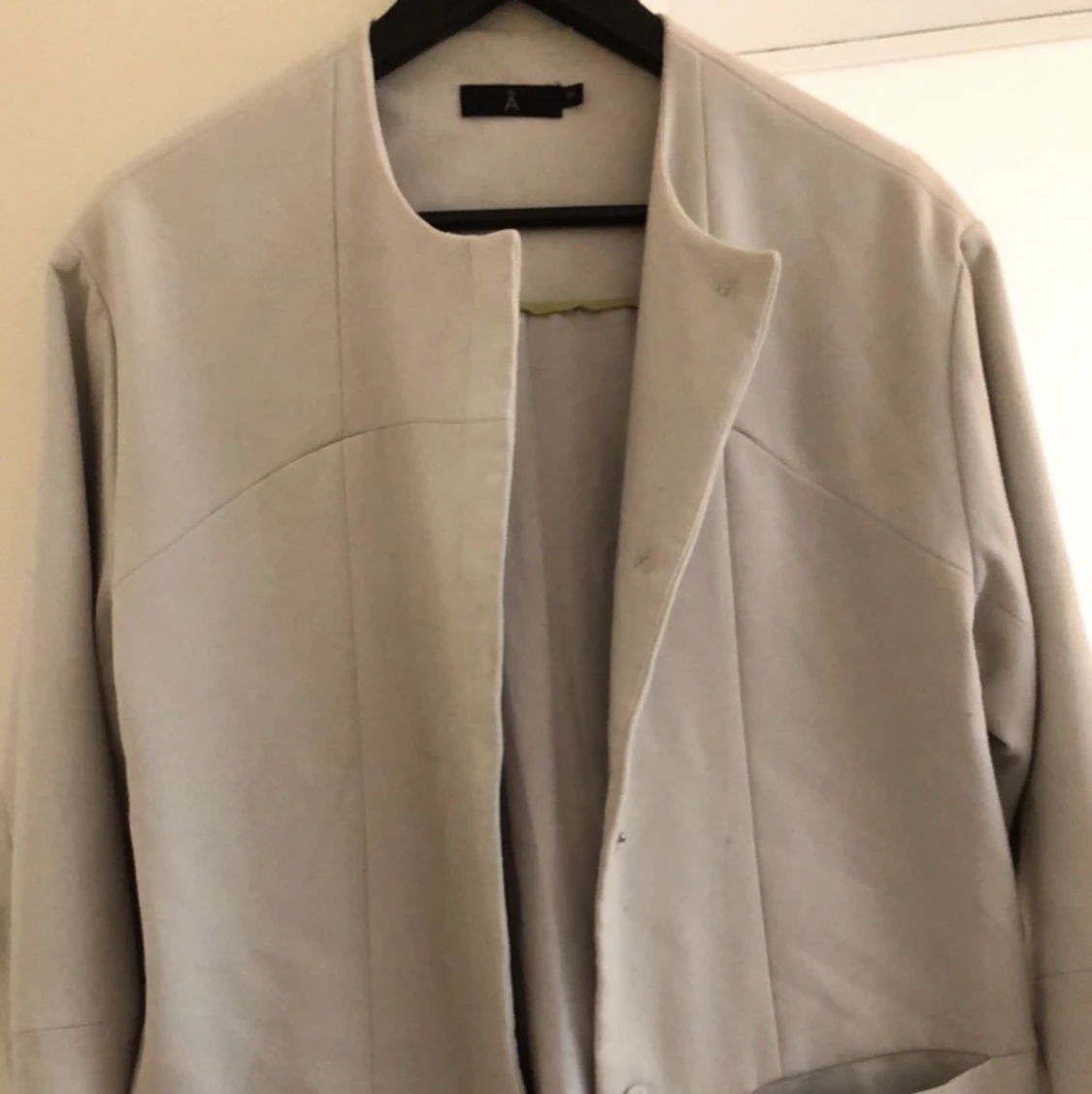 Beige kappa från Åhléns  - 90