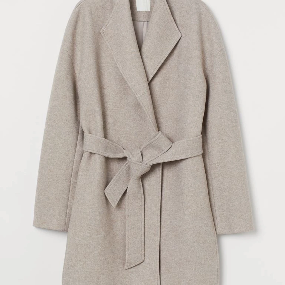 Beige kappa från HM 