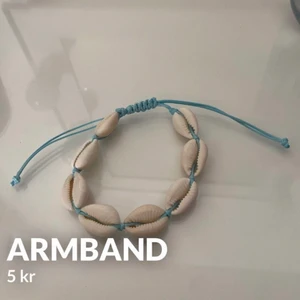 Armband - Justerbart armband med pärlor som är i helt nytt skick 
