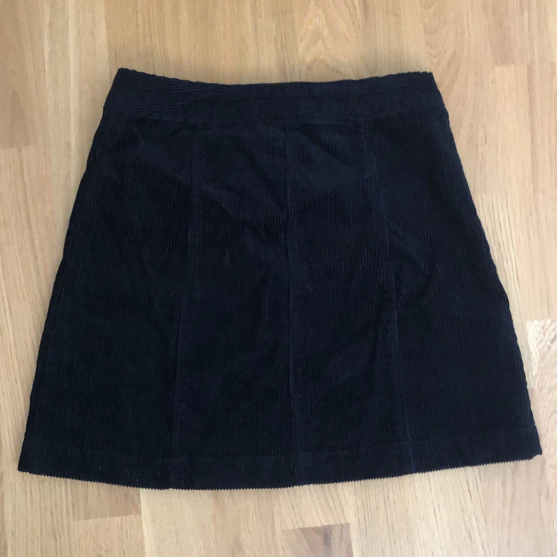 Kjol i svart manchester - 90