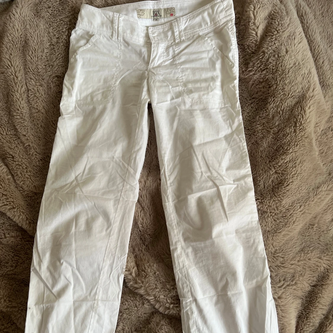 Lågmidjade linnebyxor med bootcut - 4