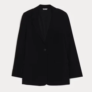 Svart kavaj - Snygg svart kavaj med en enkel knapp framtill. Kavajen har en klassisk design med långa ärmar och en stilren look. Perfekt för att ge en elegant touch till din outfit.