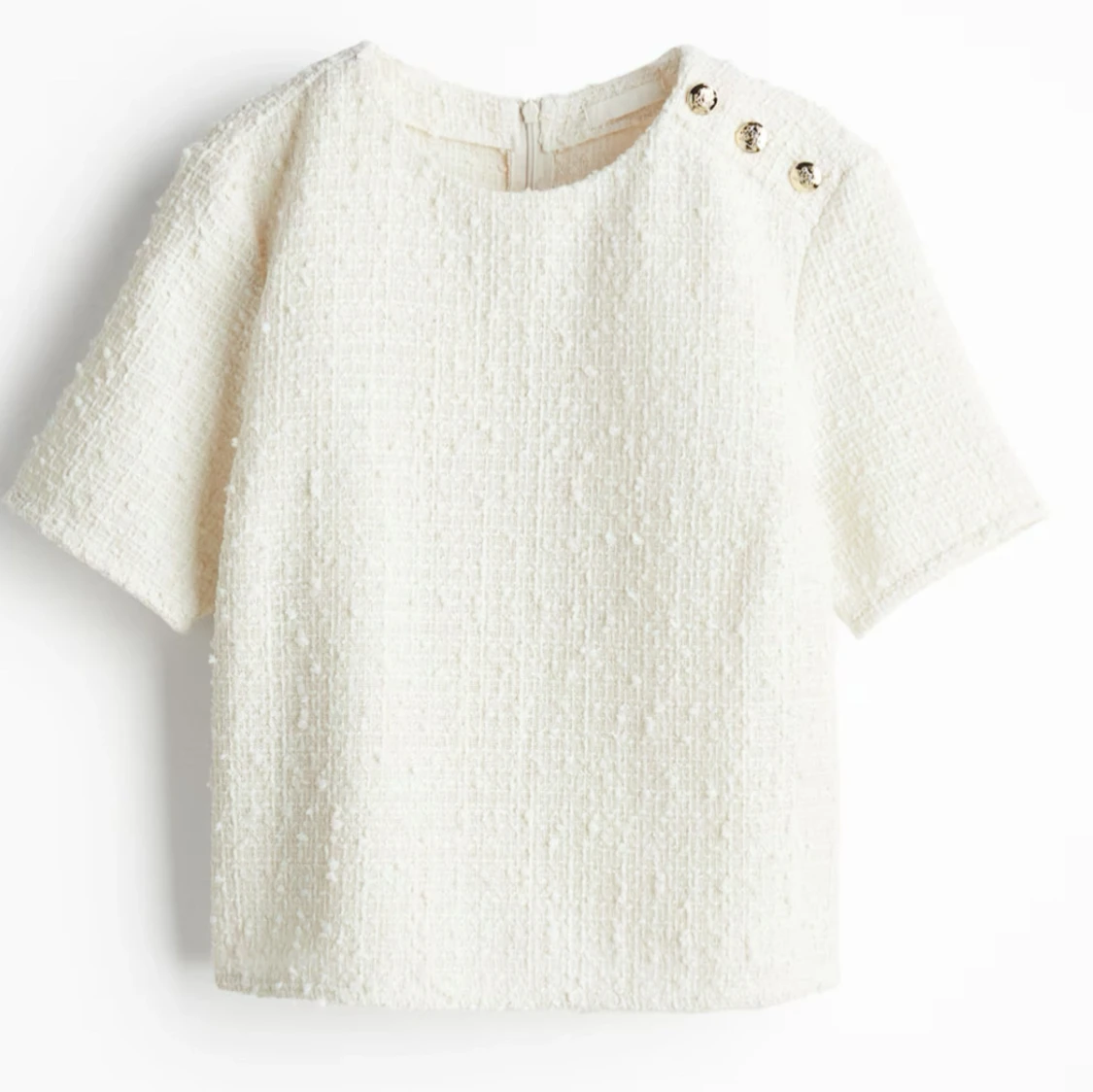 Vit bouclé blus med guldknappar