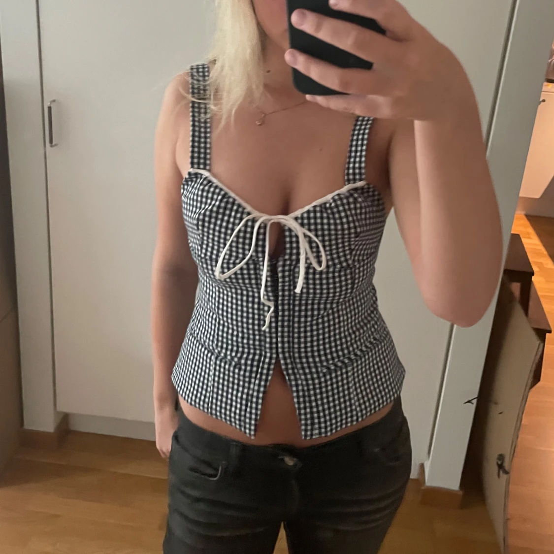 Rutig svartvit korsett med snörning