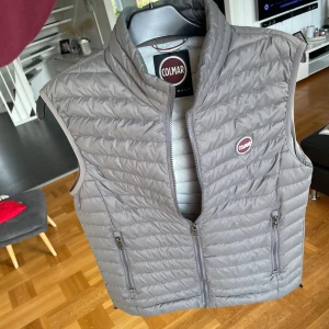 Colmar väst - Storlek 48 (S), västen är i nyskick men passar tyvärr inte mig längre