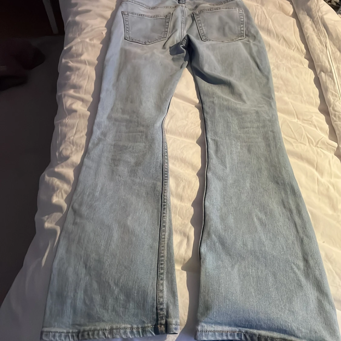 Ljusblå bootcut jeans från 157 short  - 1