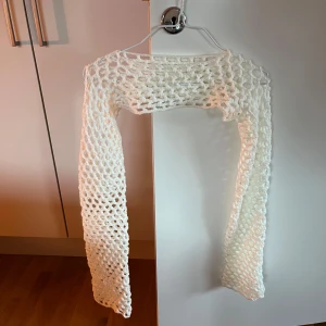 Vit stickad shrug/bolerotopp - Shrug/bolero