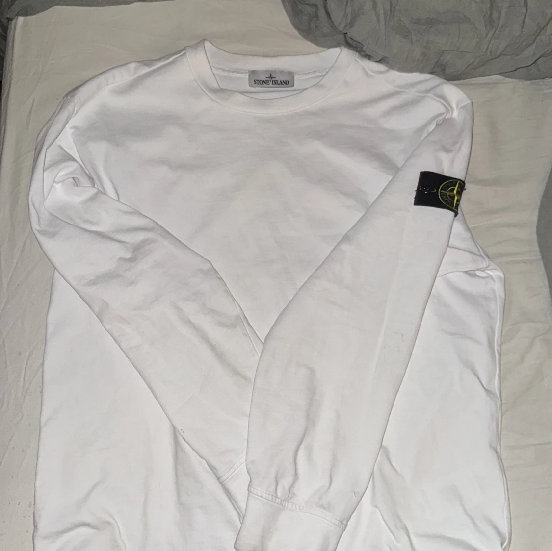 Vit långärmad tröja från Stone Island