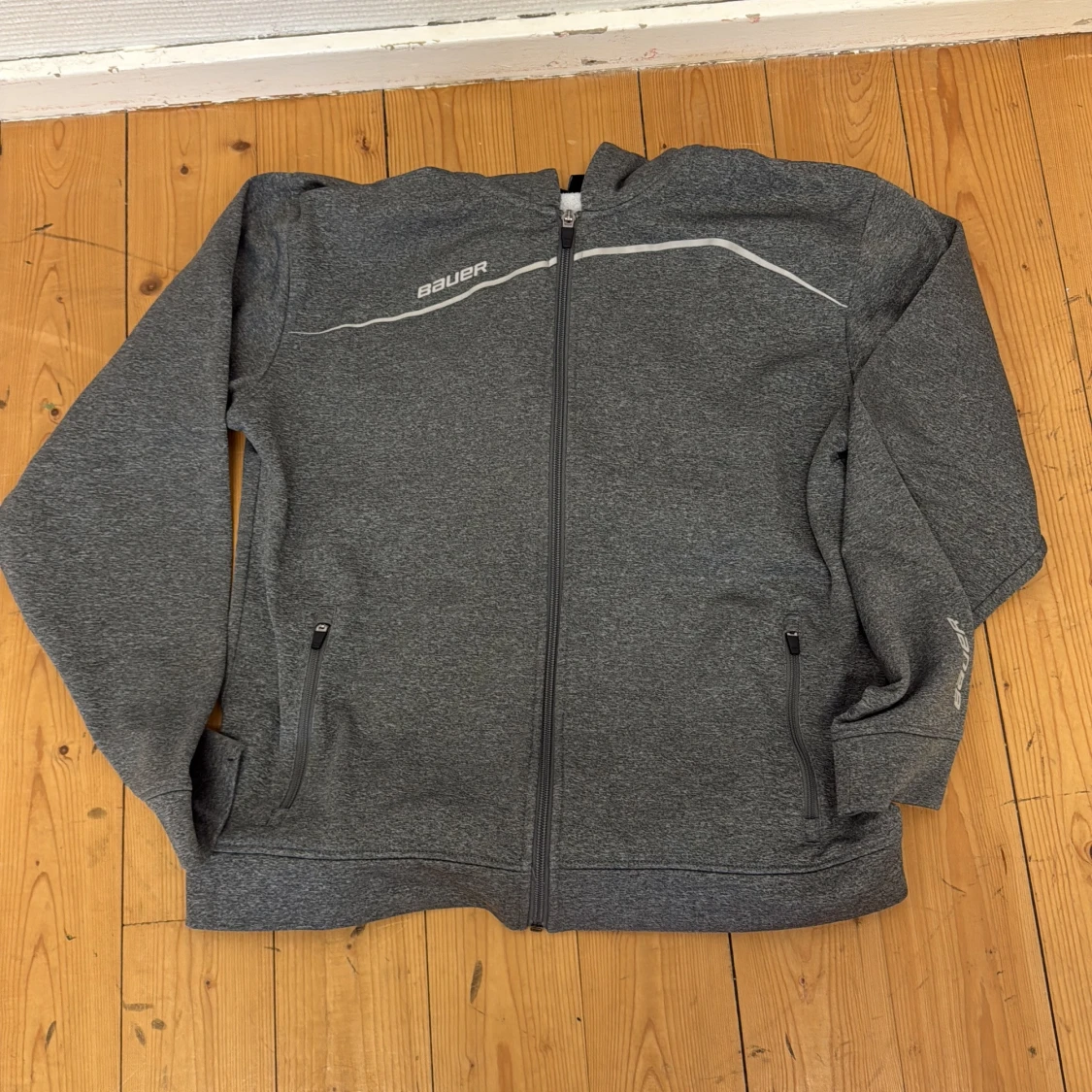 Grå ziptröja från Bauer