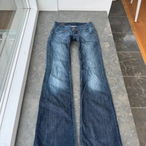 Flare bootcut low waist lee jeans - Midjemått 35-36cm innerbensmåttet 81cm