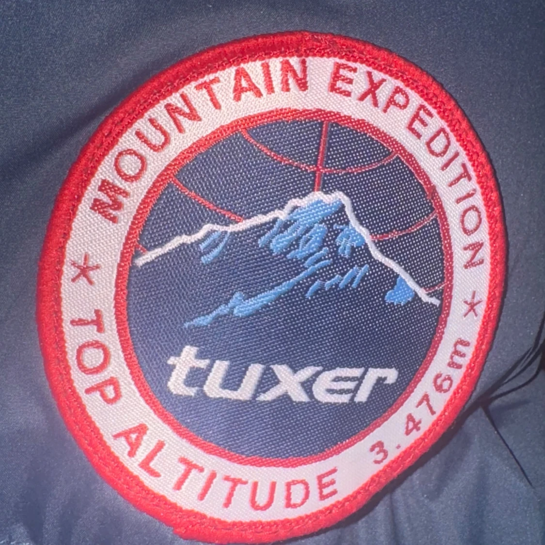 Blå dunjacka med huva från Tuxer XXS - 4