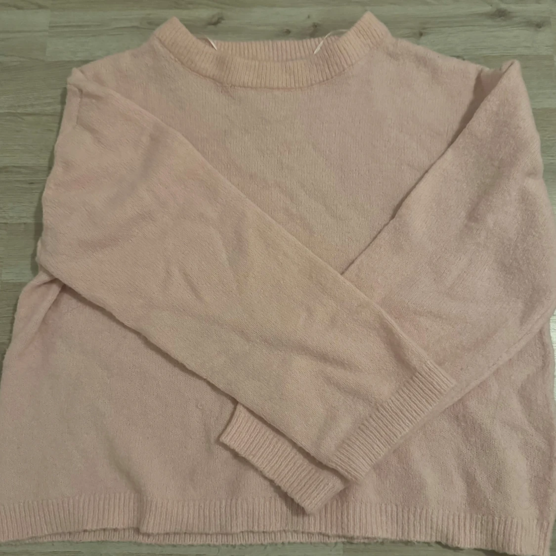 Ljusrosa stickad tröja från 157