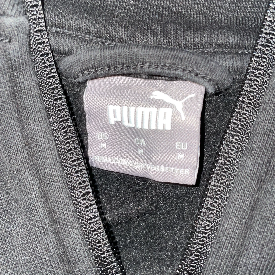 Svart och olivgrön jacka från Puma - 1