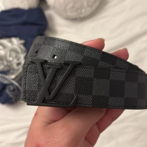 Svart rutigt bälte  - Svart rutigt bälte