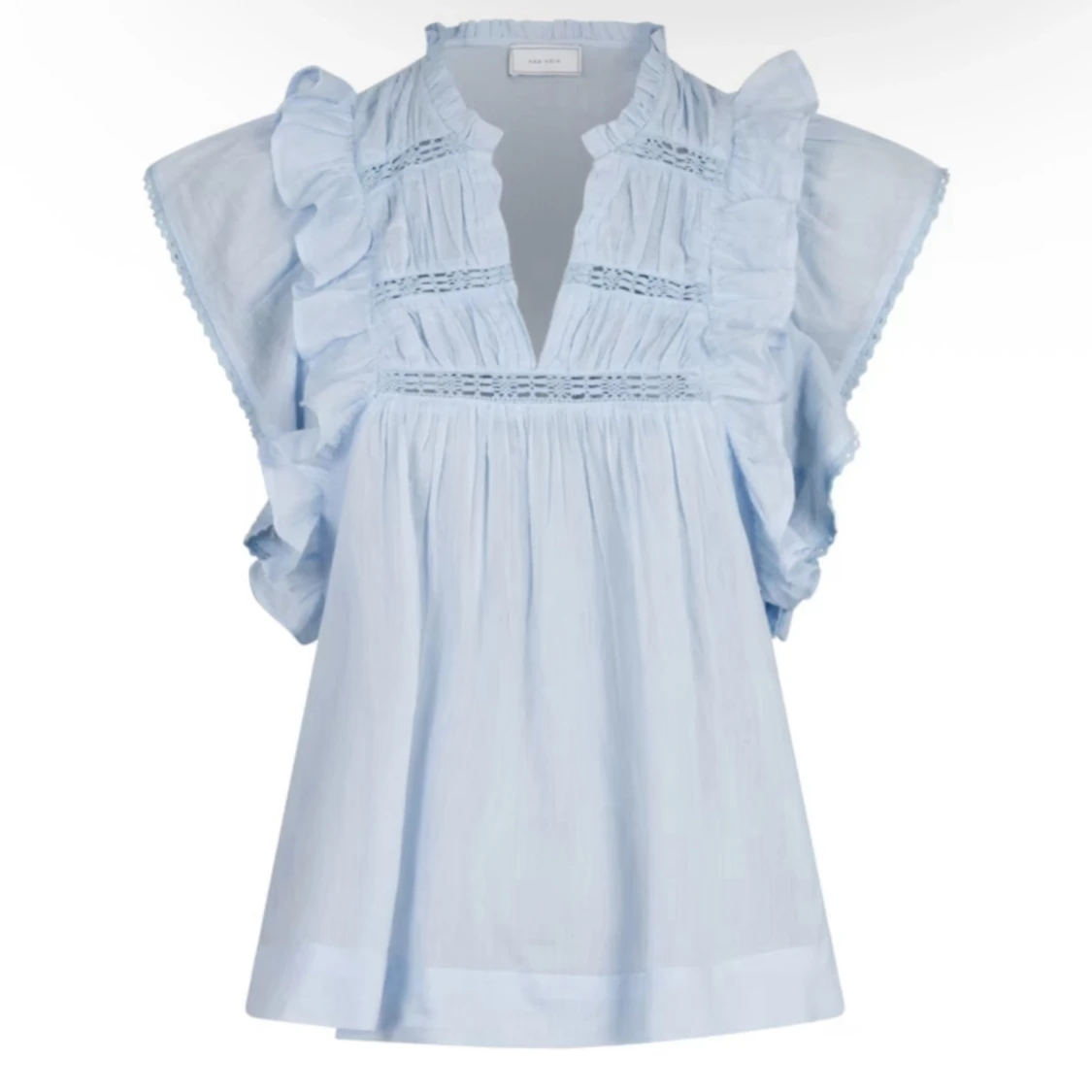 Ljusblå Neo Noir blus