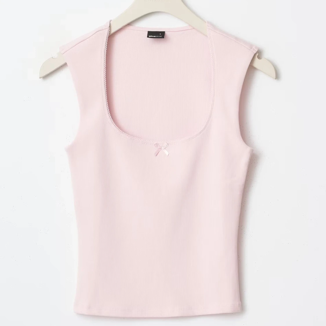 rosa topp med rosett