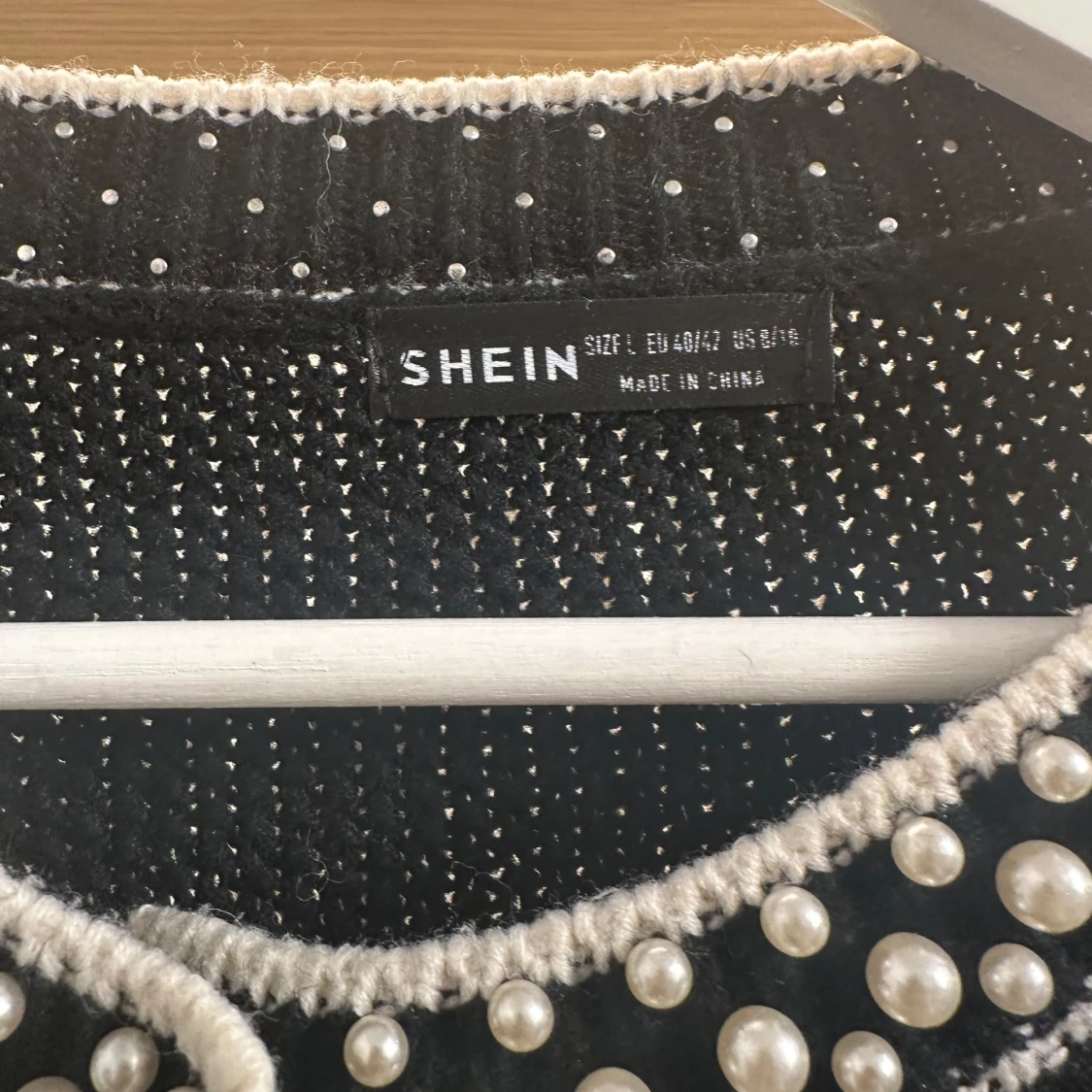 Svart kofta med pärlor från SHEIN - 1