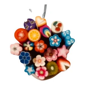 Färgglada nageldekorationer i olika former - Säljer ett set med färgglada nageldekorationer i olika former som stjärnor, blommor och frukter. Perfekt för att skapa unika nageldesigner. Dekorationerna är gjorda av ett flexibelt material och kan enkelt klippas till önskad storlek.