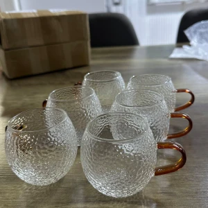 12 nya dryckesglas - Oanvänd Dryckesglas med 12 stycken.                              6 oöppnade 6 öppnade men inte oanvända  rymmer 150ml ,1,5dl