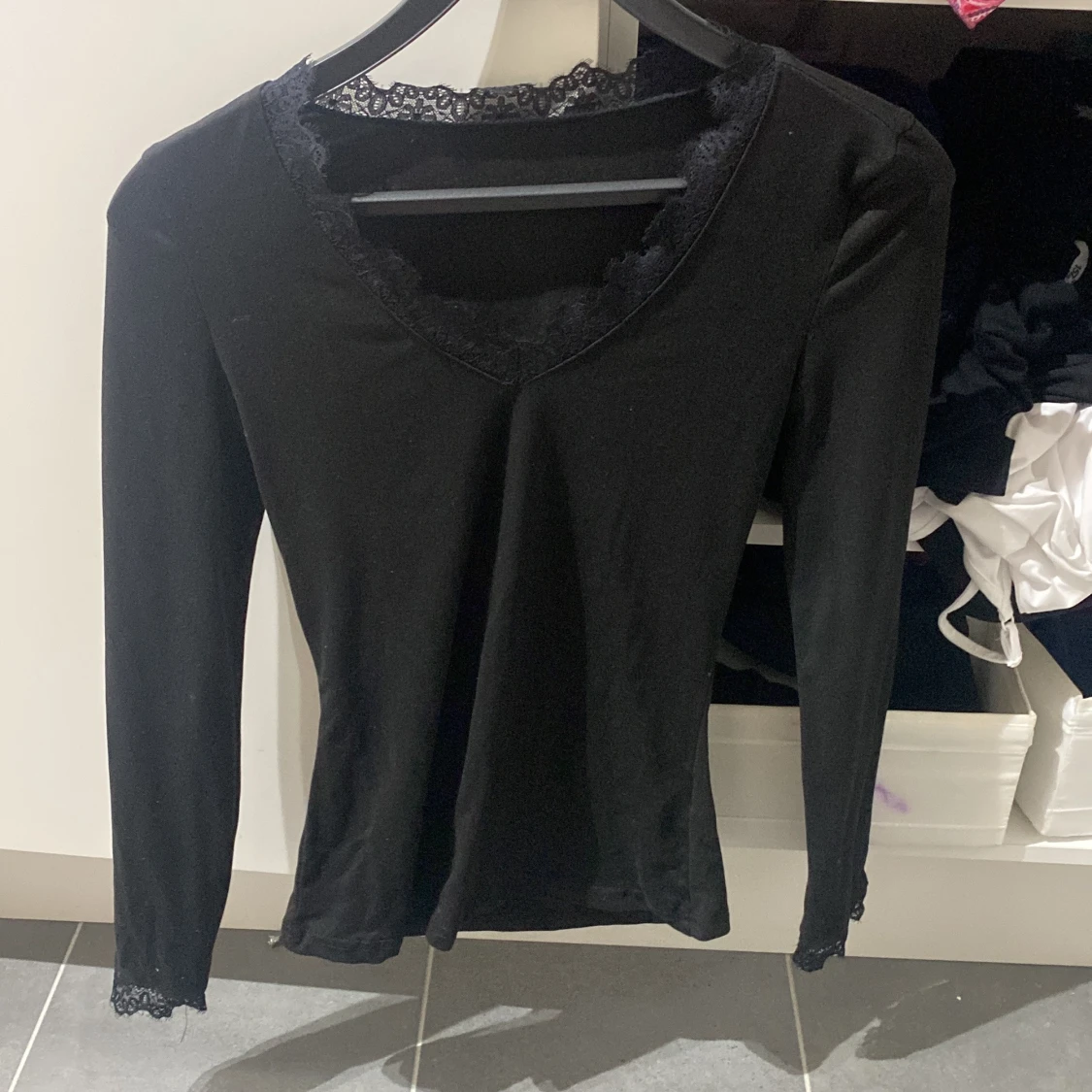 Svart långärmad topp med spets
