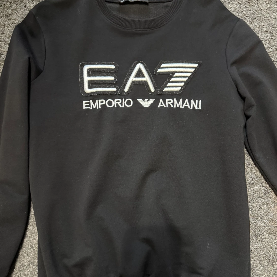 Svart sweatshirt från Emporio Armani EA7