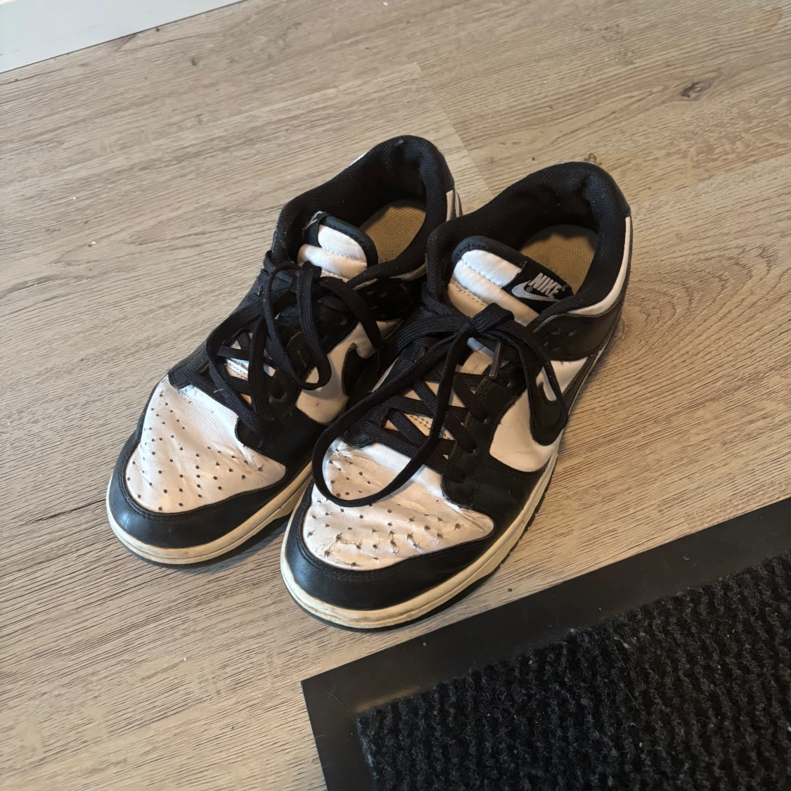 Nike Dunk Low svartvita sneakers - 1