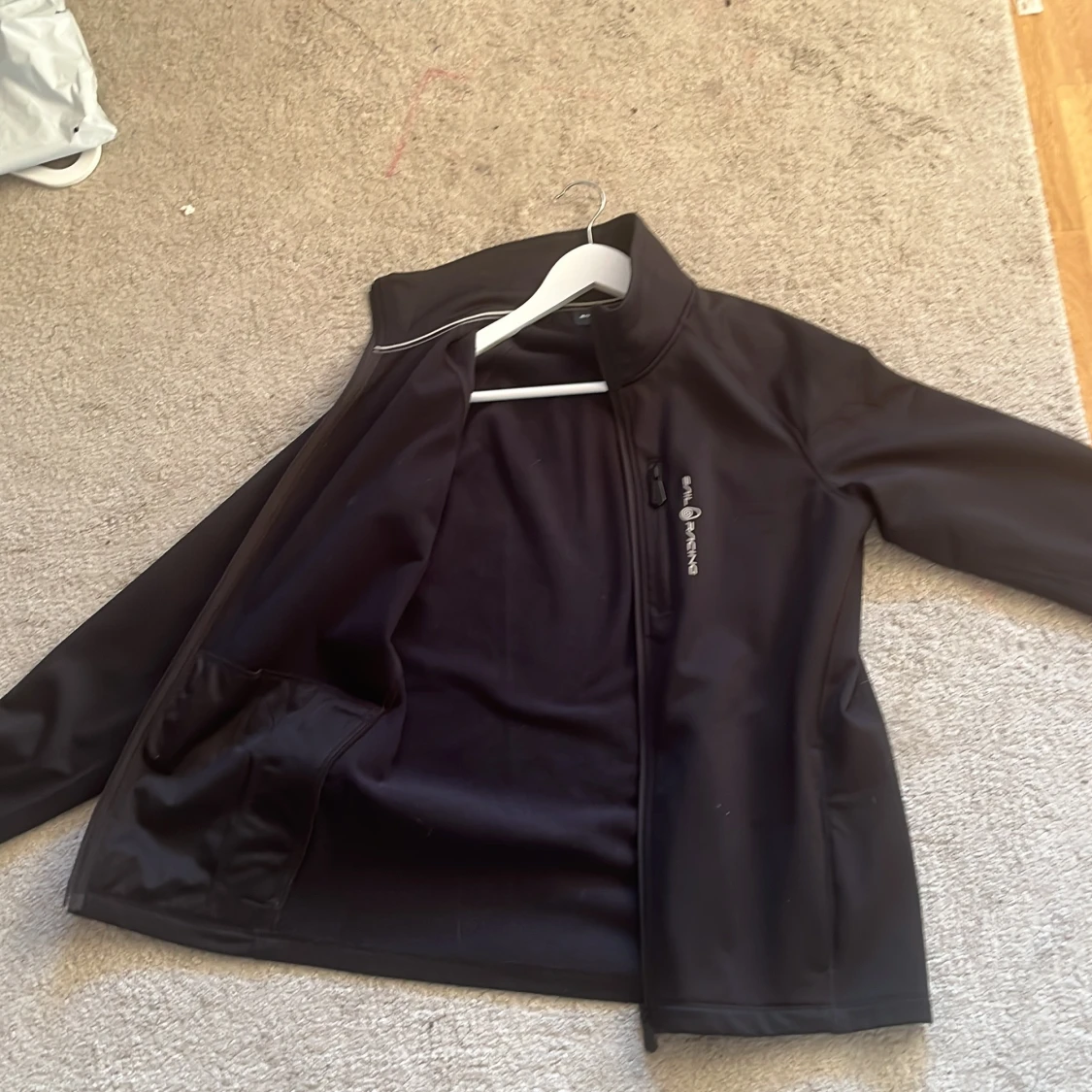 Svart vindjacka från Sail Racing M - 1