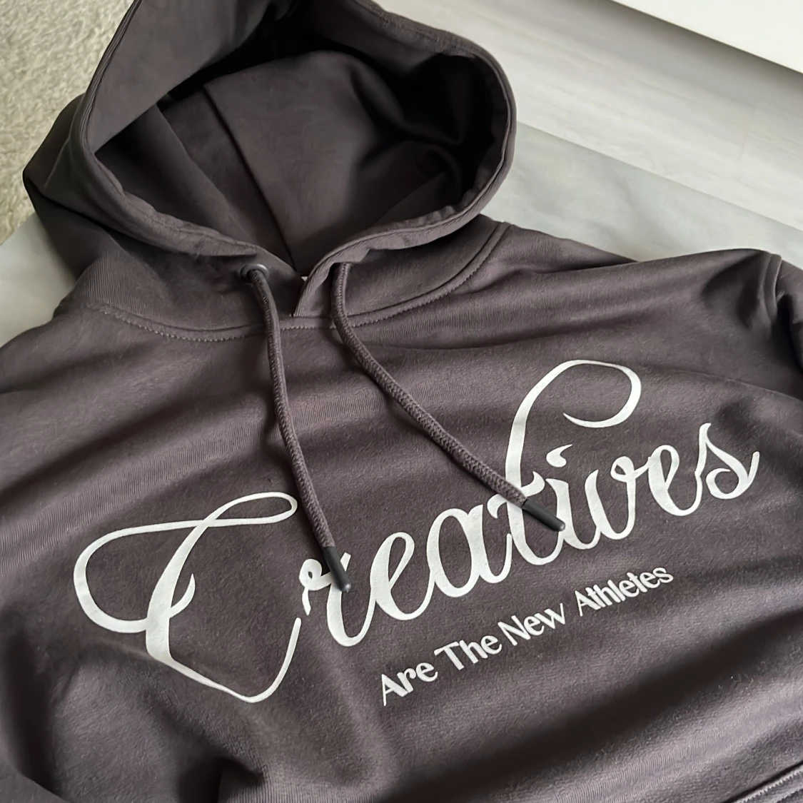 Brun hoodie från New Garments XS - 1