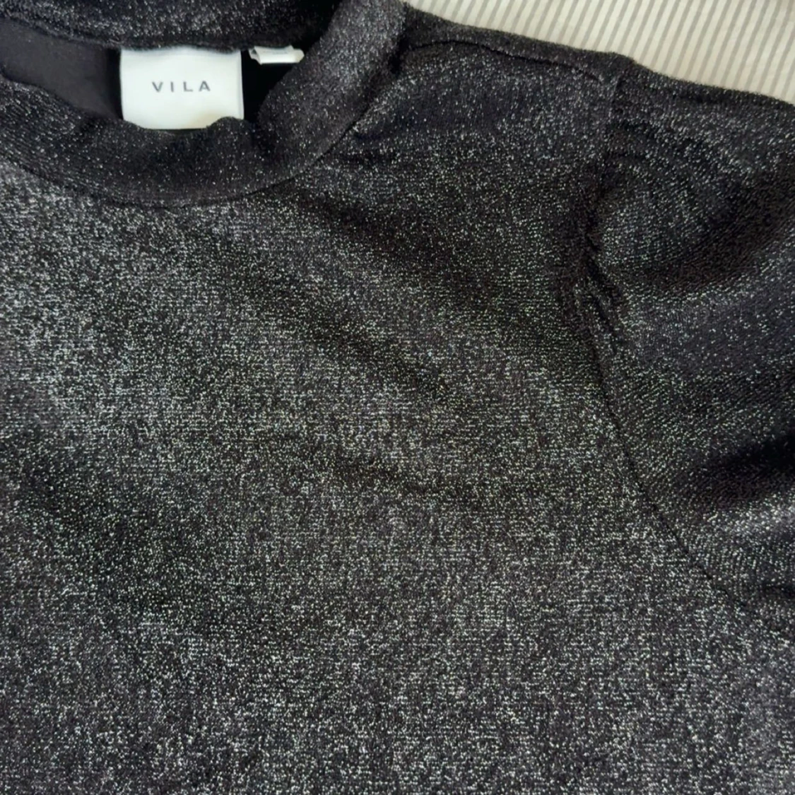 Glittrig svart topp från Vila XS - 1